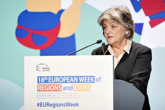 Commissioner Elisa Ferreira speaking at the podium in the Gold Hall at the Square Conference Centre. Source: EURegions Week, Flickr Commissioner Elisa Ferreira speaking at the podium in the Gold Hall at the Square Conference Centre.